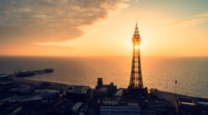 eiffel tower near body of water during sunset