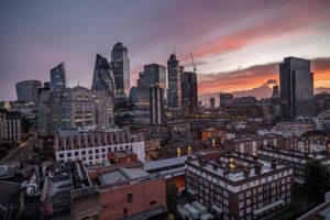 high rise buildings during sunset