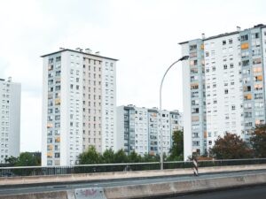 white concrete building under white sky during daytime