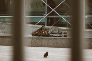 woman lying on floor near window